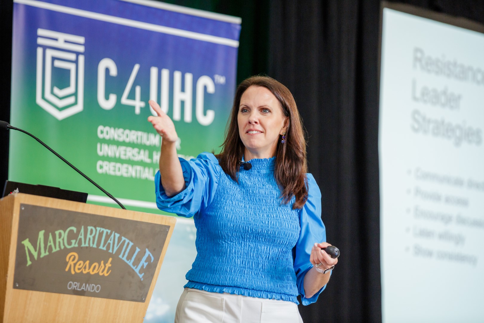 Cece Berger Sharp speaking at the C4UHC Symposium